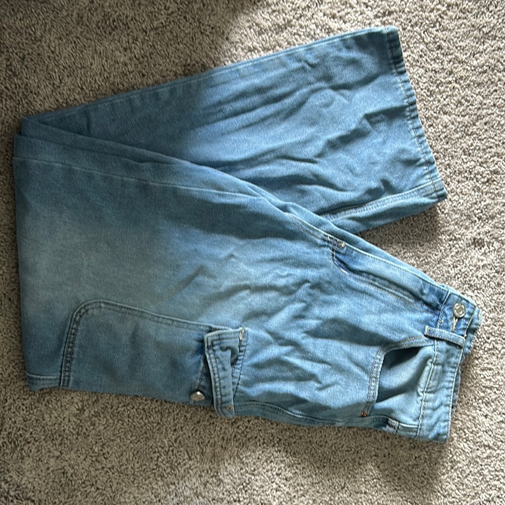 Medium wash straight leg cargo jeans